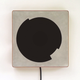 Illustration for article titled This Inductive Charger Makes Powering Up Your iPhone Beautiful